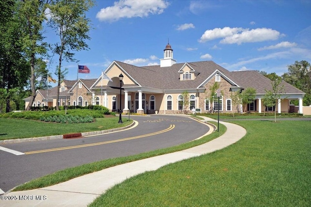 view of property with driveway