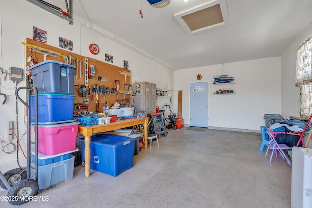 garage with a workshop area