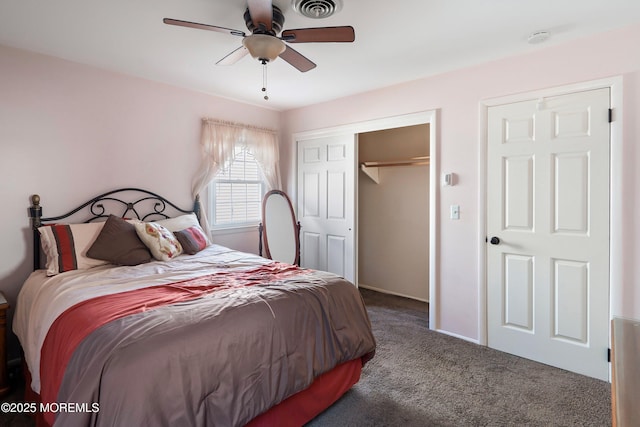 bedroom featuring carpet, visible vents, ceiling fan, and a closet