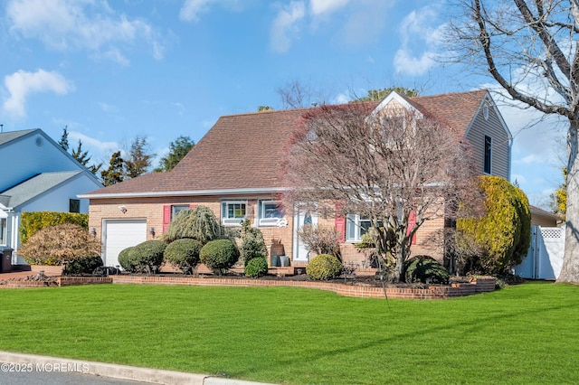 cape cod house with a garage, roof with shingles, a front lawn, and brick siding