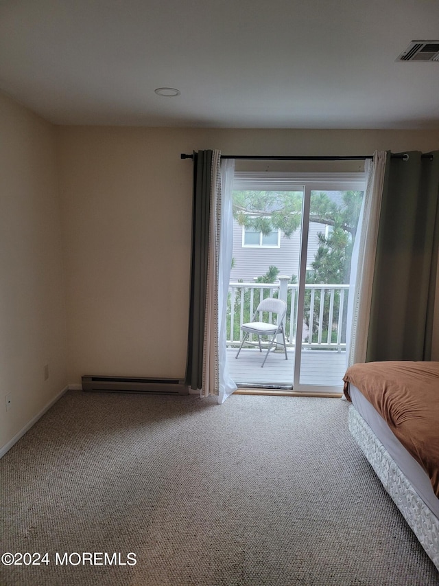 unfurnished bedroom with access to exterior, carpet, visible vents, and baseboard heating