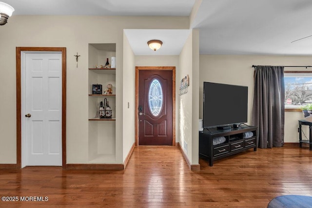 551 Chester Pkwy, Belford, NJ 07718 - foyer featuring hardwood / wood-style flooring and baseboards