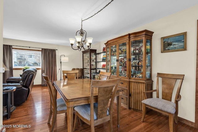 551 Chester Pkwy, Belford, NJ 07718 - dining space with baseboards, an inviting chandelier, and hardwood / wood-style floors