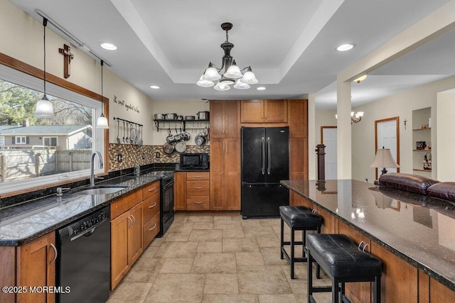 551 Chester Pkwy, Belford, NJ 07718 - kitchen featuring an inviting chandelier, black appliances, a raised ceiling, and a sink