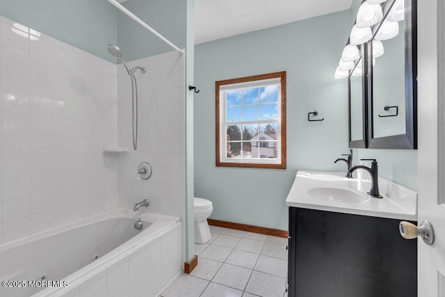 551 Chester Pkwy, Belford, NJ 07718 - bathroom featuring tile patterned flooring, baseboards, toilet, double vanity, and a sink
