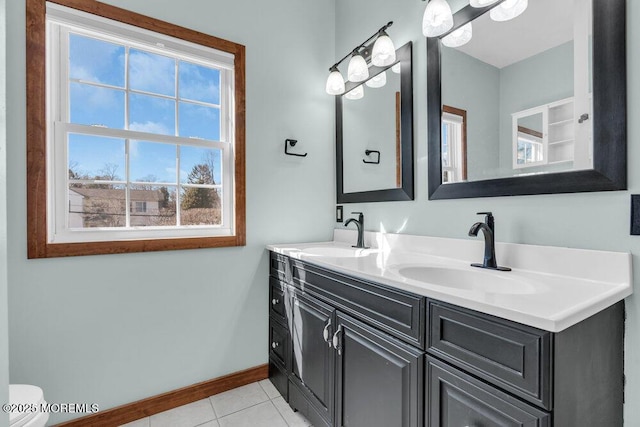 551 Chester Pkwy, Belford, NJ 07718 - full bath with tile patterned flooring, double vanity, baseboards, and a sink