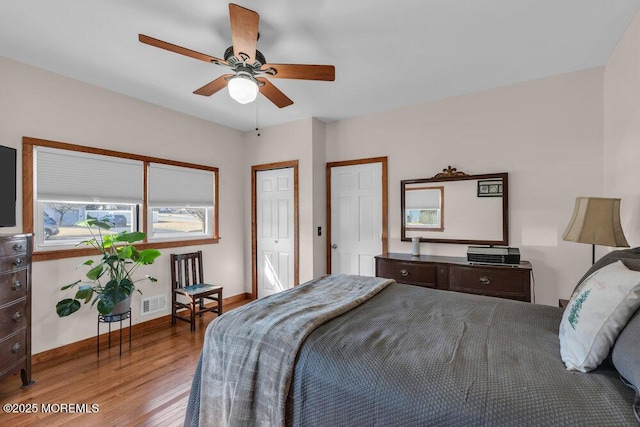 551 Chester Pkwy, Belford, NJ 07718 - bedroom featuring ceiling fan, visible vents, baseboards, and wood finished floors