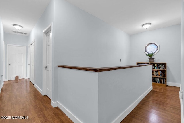 551 Chester Pkwy, Belford, NJ 07718 - hall featuring visible vents, wood finished floors, and baseboards
