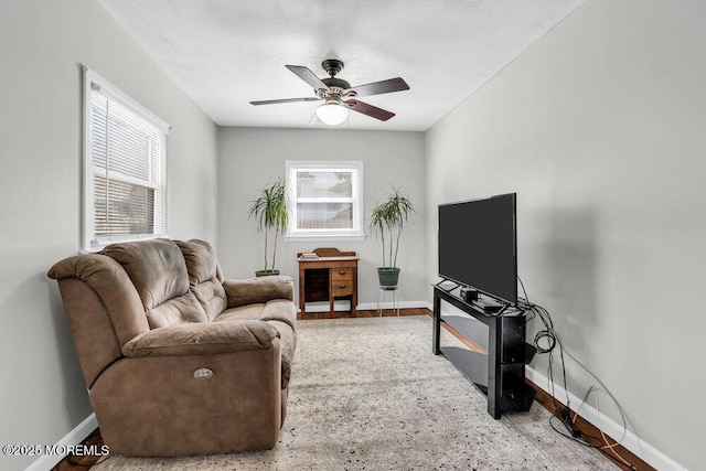 551 Chester Pkwy, Belford, NJ 07718 - living room with a wealth of natural light, baseboards, and ceiling fan