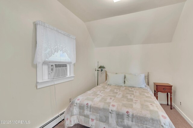 bedroom featuring baseboards, a baseboard radiator, carpet, vaulted ceiling, and cooling unit