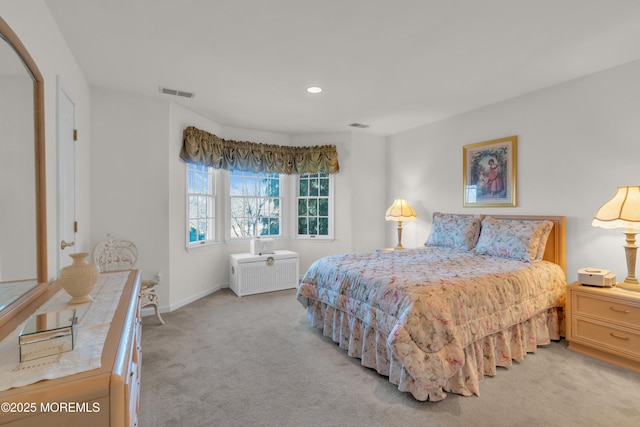 carpeted bedroom with recessed lighting, baseboards, and visible vents