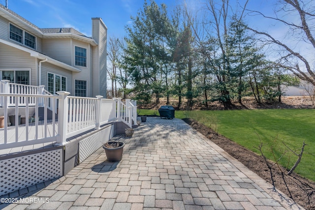 view of patio with a wooden deck