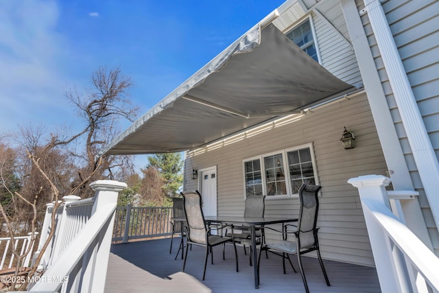 deck featuring outdoor dining space