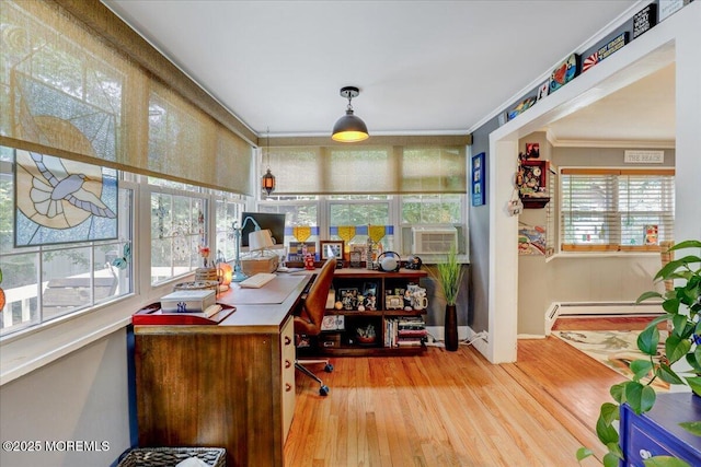 office area with crown molding, cooling unit, baseboard heating, and wood finished floors