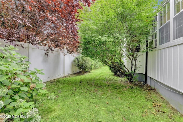 view of yard featuring fence