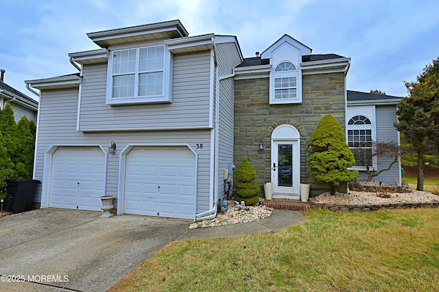 view of front of house with driveway, stone siding, a garage, and a front lawn