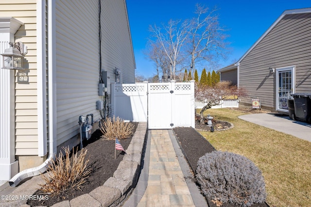 view of yard featuring a gate and fence