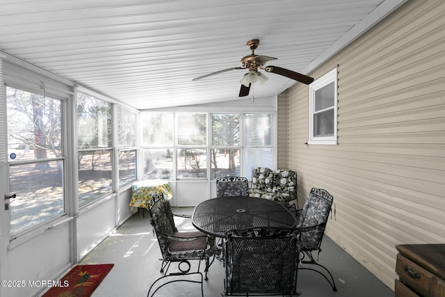 sunroom with a ceiling fan and a wealth of natural light