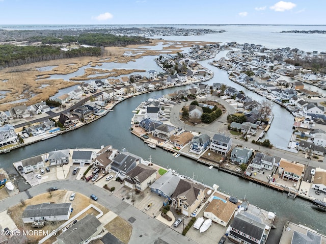 aerial view with a water view and a residential view