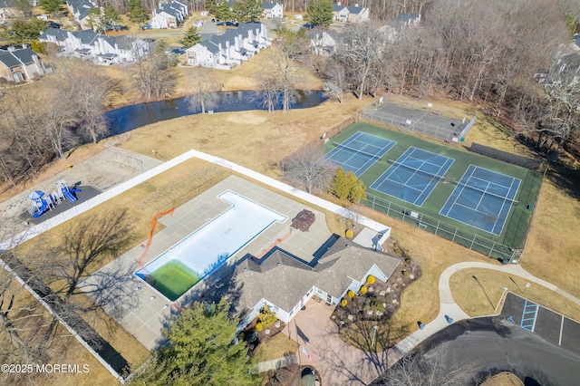 aerial view featuring a residential view and a water view