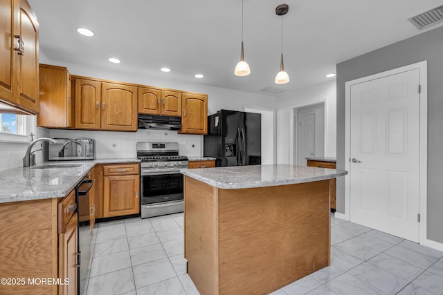 kitchen with marble finish floor, black appliances, visible vents, and under cabinet range hood