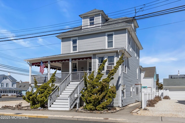2-4 NE Central Ave, Seaside Park, NJ 08752 - view of front of house featuring cooling unit, a porch, and stairs