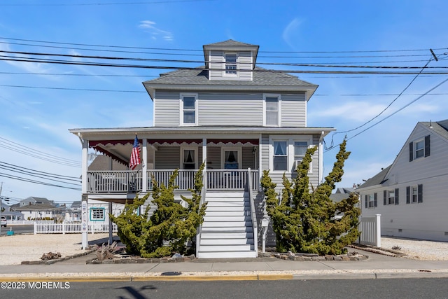 2-4 NE Central Ave, Seaside Park, NJ 08752 - view of front of home with a porch, a shingled roof, stairs, and fence