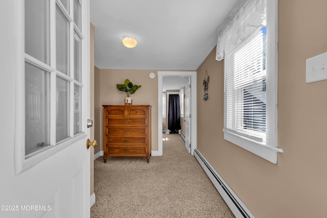 2-4 NE Central Ave, Seaside Park, NJ 08752 - hallway featuring light carpet, baseboard heating, and baseboards