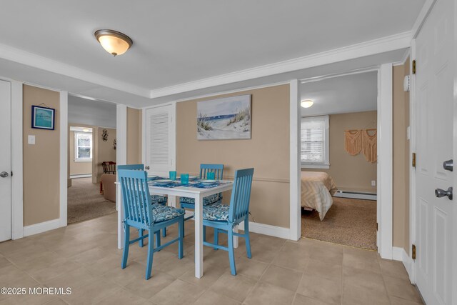 2-4 NE Central Ave, Seaside Park, NJ 08752 - dining area featuring a baseboard heating unit, a healthy amount of sunlight, baseboards, and a baseboard radiator