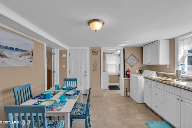 2-4 NE Central Ave, Seaside Park, NJ 08752 - interior space featuring washer / clothes dryer, plenty of natural light, and light tile patterned flooring