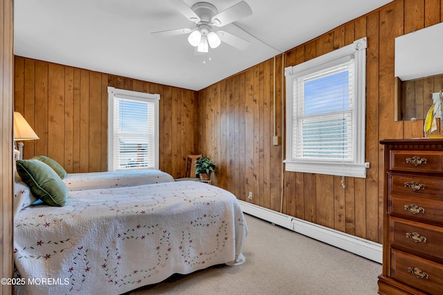 2-4 NE Central Ave, Seaside Park, NJ 08752 - carpeted bedroom featuring baseboard heating, a ceiling fan, and wooden walls
