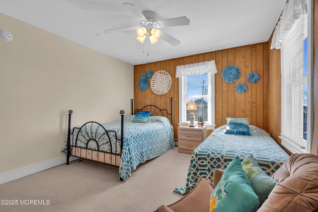2-4 NE Central Ave, Seaside Park, NJ 08752 - carpeted bedroom featuring wooden walls, a ceiling fan, and baseboards