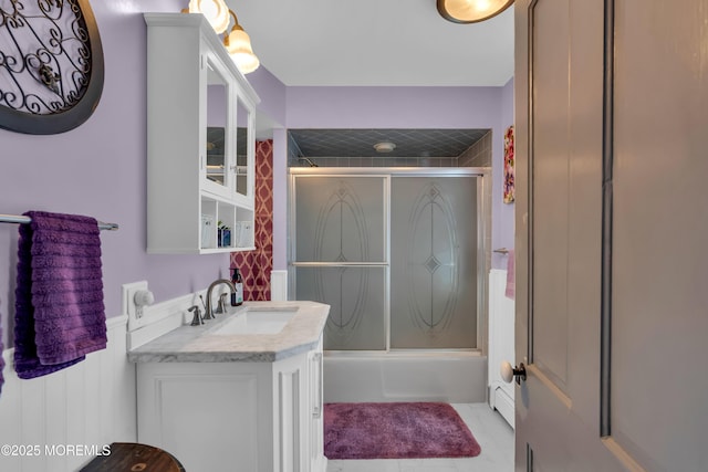2-4 NE Central Ave, Seaside Park, NJ 08752 - bathroom with vanity, bath / shower combo with glass door, and wainscoting