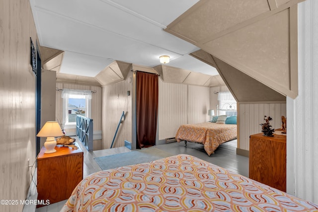2-4 NE Central Ave, Seaside Park, NJ 08752 - bedroom with lofted ceiling, multiple windows, and wood finished floors