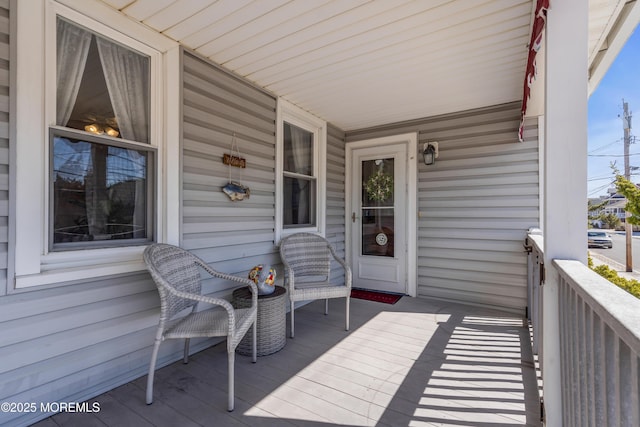 2-4 NE Central Ave, Seaside Park, NJ 08752 - wooden terrace with covered porch
