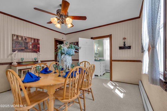 2-4 NE Central Ave, Seaside Park, NJ 08752 - dining room with a baseboard heating unit, light carpet, ceiling fan, and ornamental molding