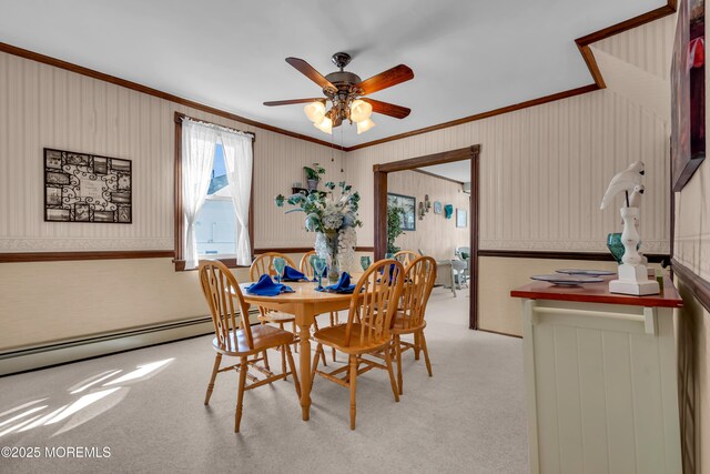 2-4 NE Central Ave, Seaside Park, NJ 08752 - dining room with ceiling fan, a baseboard heating unit, light carpet, and ornamental molding