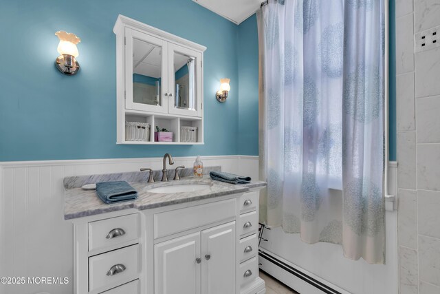 2-4 NE Central Ave, Seaside Park, NJ 08752 - full bathroom with vanity, a wainscoted wall, and a baseboard radiator