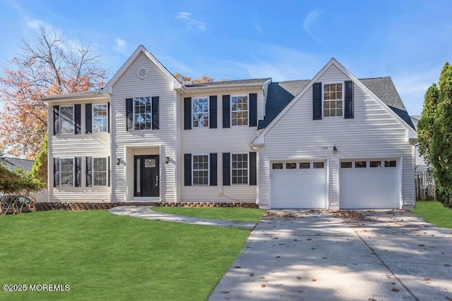 colonial house featuring a garage, concrete driveway, roof with shingles, and a front lawn