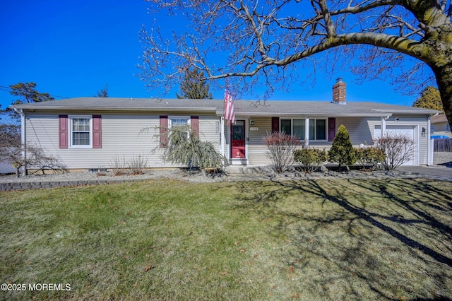 single story home with an attached garage, a chimney, and a front yard