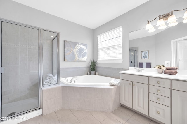 full bath with a garden tub, tile patterned flooring, vanity, and a shower stall