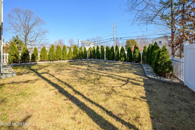 view of yard featuring fence