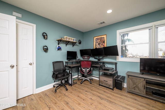 office with recessed lighting, visible vents, baseboards, and wood finished floors