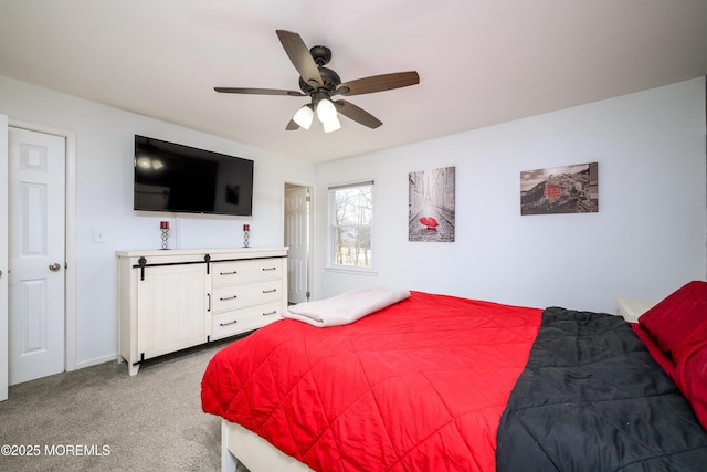 bedroom with light colored carpet and a ceiling fan