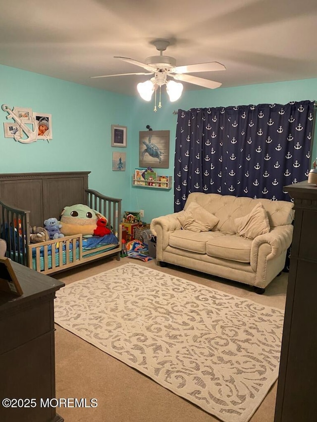 bedroom featuring carpet flooring and a ceiling fan