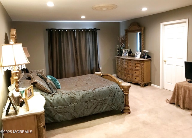 bedroom with recessed lighting, baseboards, and carpet floors