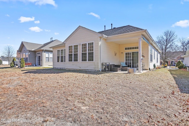 rear view of house with a patio