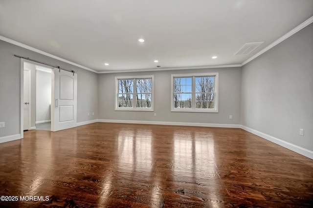 interior space featuring wood finished floors, baseboards, visible vents, recessed lighting, and crown molding