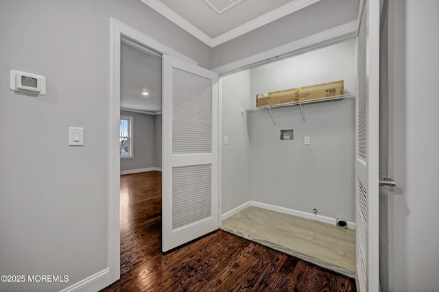 washroom featuring baseboards, laundry area, dark wood-style flooring, washer hookup, and crown molding