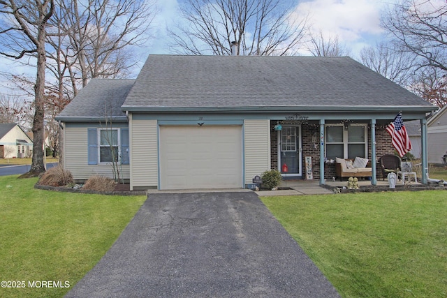 view of front of home featuring an attached garage, covered porch, a shingled roof, driveway, and a front lawn